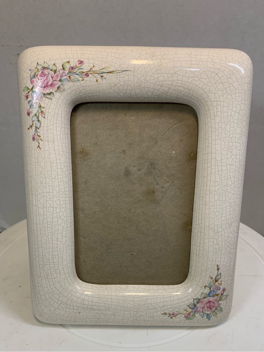 Vintage Off White Crackle Ceramic Pink Floral Design 6.5”x 5” Frame.        3351